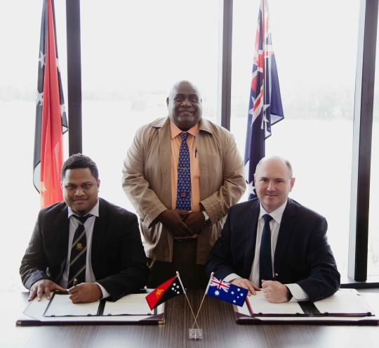 Australia and Papua New Guinea MoU on Cooperation in Info and Comms Technology, by department's Secretary, Simon Atkinson, and Steven Matainaho, Acting Secretary of Papua New Guinea's Department of Communications and Information Technology.