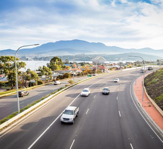 Multiple vehicles driving on a multi-lane road