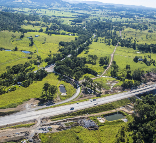 Aerial photo of 2018 roadworks on the Bruce Highway, surrounded by green countryside