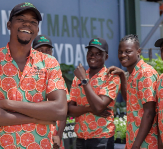 Image courtesy of RDA Townsville and North West Queensland. Group of men wearing similar shirts.