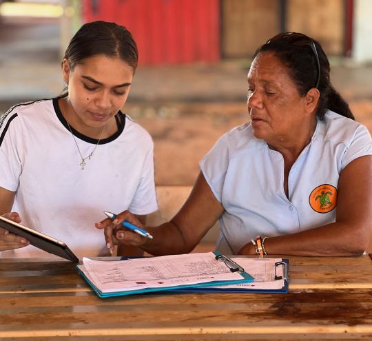 Co-researcher Audrey Shadforth undertaking a survey with Tyresha Gore in Djarindjin on First Nations Digital Inclusion Source acknowledgement: Dr Daniel Featherstone – ADM+S Mapping the Digital Gap Project