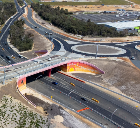 Aerial view of an interchange and overpass of the new Wilman Wadandi Highway.