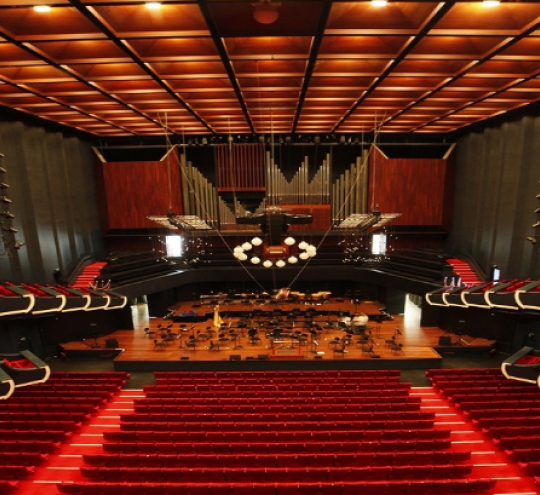 View from high seating towards a stage inside Perth Concert Hall.