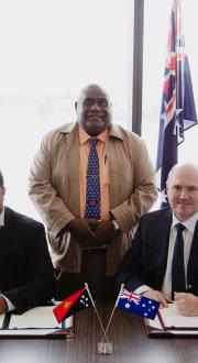 Australia and Papua New Guinea MoU on Cooperation in Info and Comms Technology, by department's Secretary, Simon Atkinson, and Steven Matainaho, Acting Secretary of Papua New Guinea's Department of Communications and Information Technology.