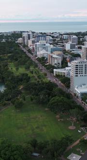 Aerial view of Darwin showing open green space on the harbour foreshore and city builidngs. 