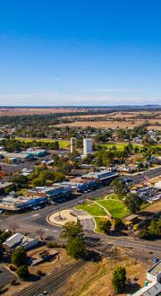 Aerial view of a suburb with a blue sky.