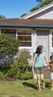 Family enjoying their time together outside their home.