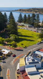 Image of Granite Island and coast, grass, and buildings of Victor Harbour, South Australia. Image credit: Victor Harbor City Council.