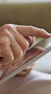 Older woman using tablet