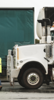 Driver about to board a parked truck.