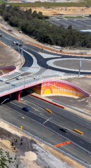 Aerial view of an interchange and overpass of the new Wilman Wadandi Highway.