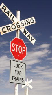 Railway crossing and stop sign.