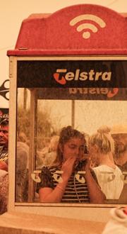 A payphone being used in bushfires at Narooma, January 2020. Photo credit: Tim Roche.