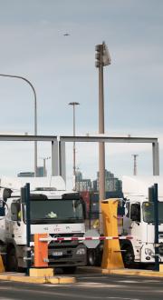 Trucks entering freight facility.