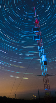 Satellite communications under a starry sky.