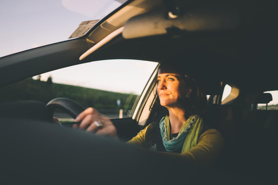 driver of a car as seen from the dash